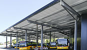 Halle logistique et bâtiment commercial, nouvelle station-service et station de lavage pour véhicules pour Faucherre Transport SA à Moudon