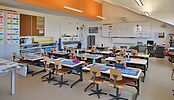 Construction d'un bâtiment scolaire, pré-scolaire et logements à Etagnières