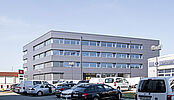 Construction d'un immeuble d'activités, Milliet SA, comprenant garage avec atelier de réparations, station de lavage, contrôle de véhicules, parking et stockage voitures, bureaux, vestiaires et cafétéria