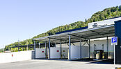 Halle logistique et bâtiment commercial, nouvelle station-service et station de lavage pour véhicules pour Faucherre Transport SA à Moudon
