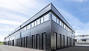 Construction d'un bâtiment comprenant surfaces industrielles et commerciales entièrement modulables à Bevaix