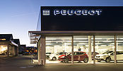 Construction d'un showroom Peugeot avec atelier et bureaux à Gland