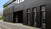 Construction d'un bâtiment comprenant surfaces industrielles et commerciales entièrement modulables à Bevaix