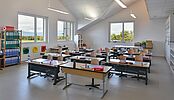 Construction d'un bâtiment scolaire, pré-scolaire et logements à Etagnières