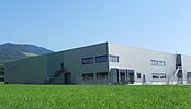 Extension du premier bâtiment, nouvelle halle de stockage à Semsales pour Courlux International SA