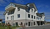 Construction d'un bâtiment scolaire, pré-scolaire et logements à Etagnières