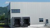 Extension du premier bâtiment, nouvelle halle de stockage à Semsales pour Courlux International SA